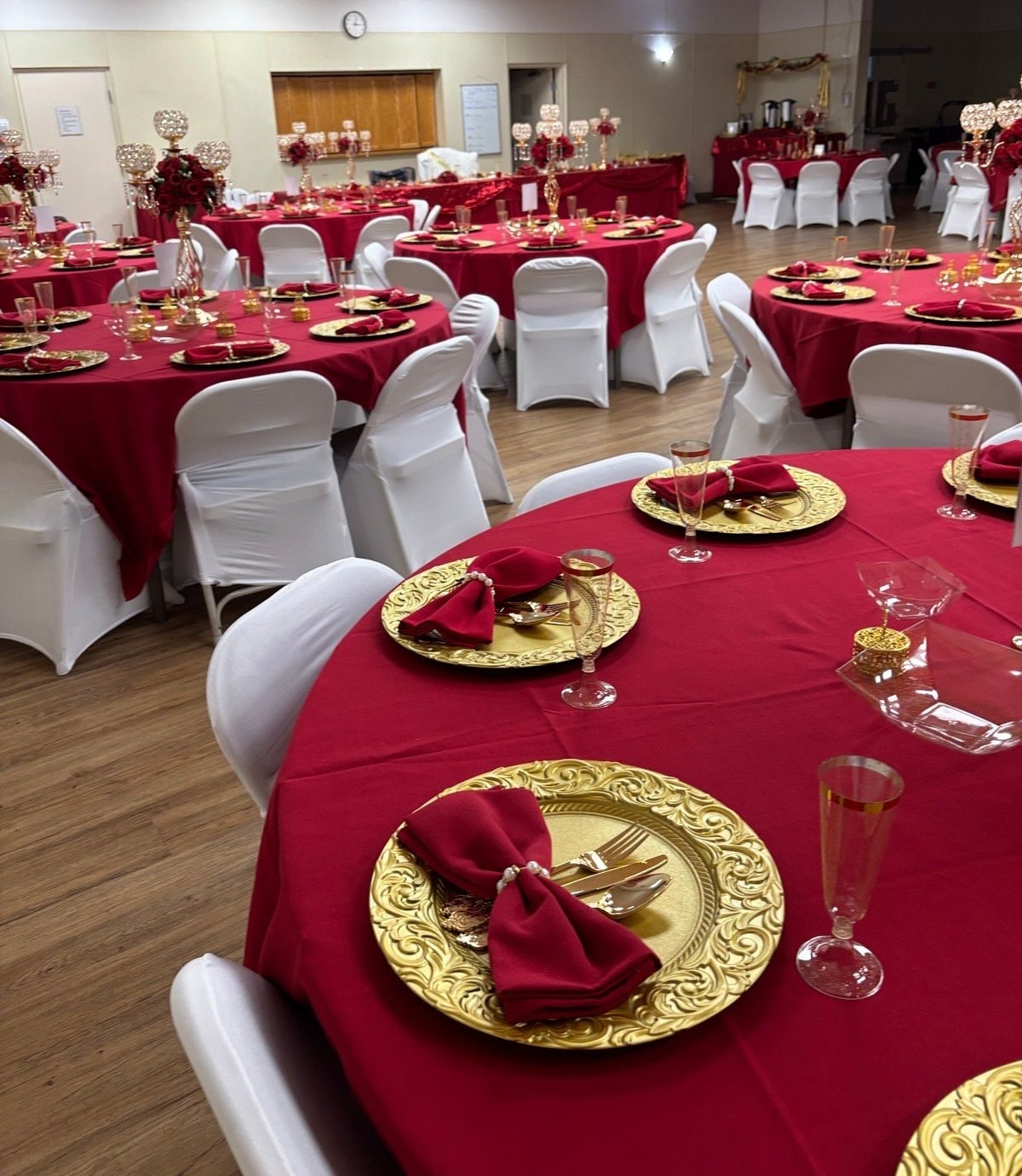Elegant banquet hall with red linens