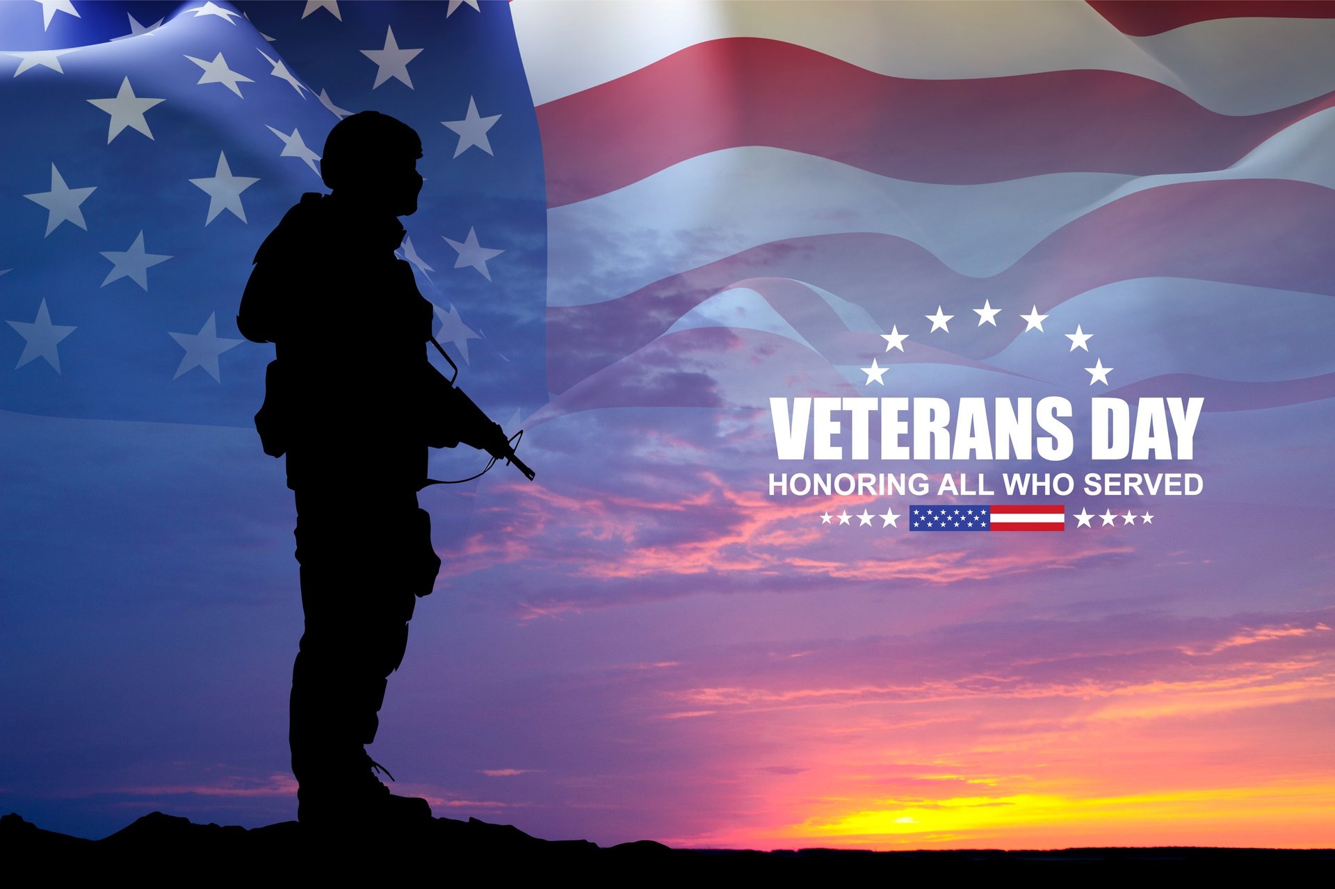 Silhouette of a soldier with USA flag against the sunset. Veterans, Memorial Day concept